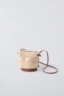 BANDOLERA SACA PELO