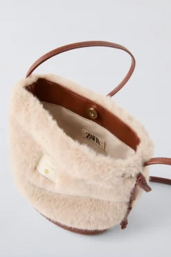 BANDOLERA SACA PELO