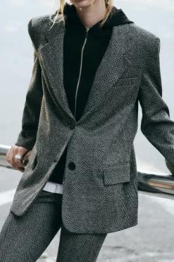BLAZER ESPIGA COMBINADA CAPUCHA