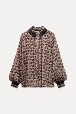 BLUSA ESTAMPADA NIDO DE ABEJA