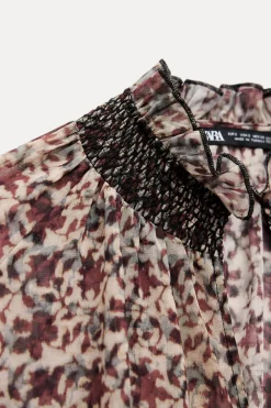 BLUSA ESTAMPADA NIDO DE ABEJA