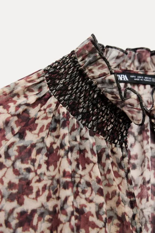 BLUSA ESTAMPADA NIDO DE ABEJA
