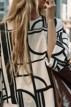 BLUSA ESTAMPADO GEOMÉTRICO
