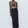 BODY DRAPEADO TUL ESTAMPADO ANIMAL