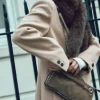 BOLSO ALARGADO TACHAS