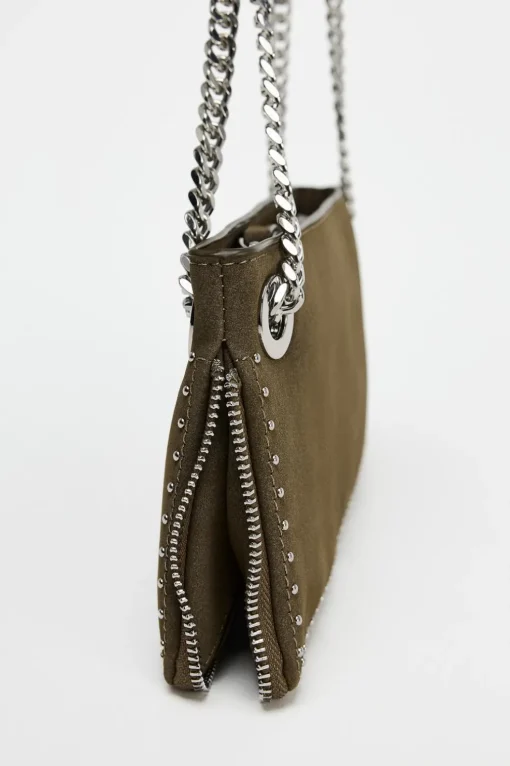 BOLSO ALARGADO TACHAS