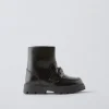 BOTA ADORNO