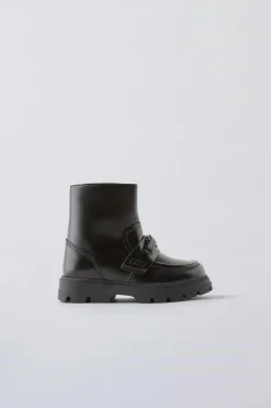 BOTA ADORNO