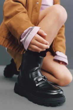 BOTA ADORNO