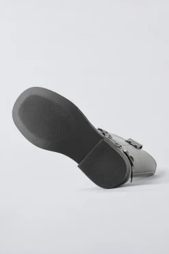 BOTA ALTA HEBILLAS