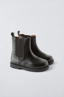 BOTA PICADOS PIEL