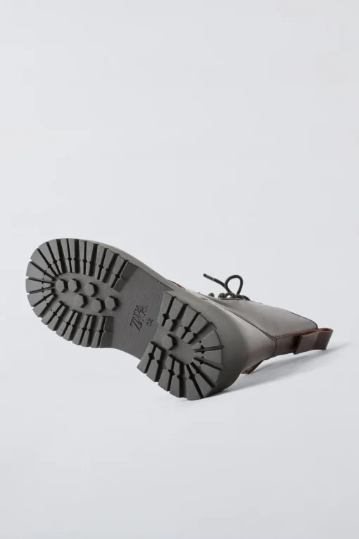 BOTÍN PIEL CORDONES