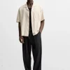 CAMISA BOXY FIT BOLSILLO