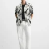CAMISA ELÁSTICA ESTAMPADO HOJAS