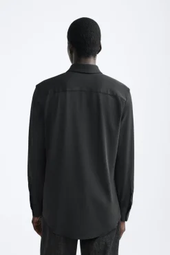CAMISA ELÁSTICA ESTRUCTURA