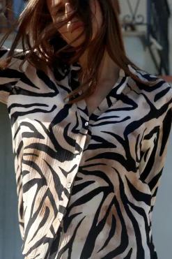 CAMISA FLUIDA ESTAMPADO ANIMAL