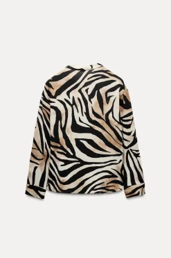 CAMISA FLUIDA ESTAMPADO ANIMAL