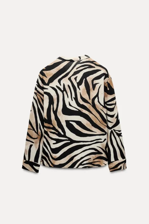 CAMISA FLUIDA ESTAMPADO ANIMAL