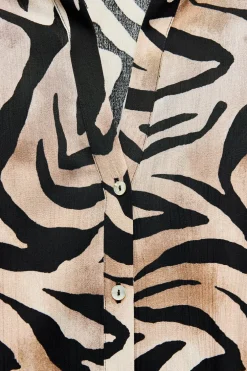 CAMISA FLUIDA ESTAMPADO ANIMAL