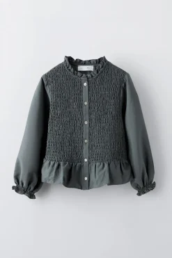 CAMISA GOMAS