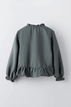 CAMISA GOMAS