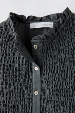 CAMISA GOMAS