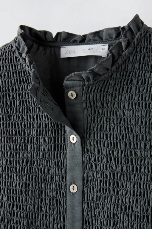 CAMISA GOMAS