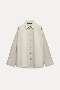 CAMISA OVERSIZE BOTONES LATERALES