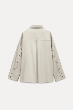 CAMISA OVERSIZE BOTONES LATERALES