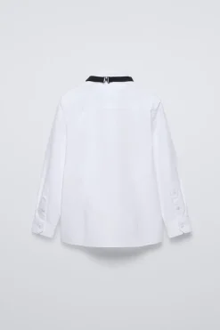 CAMISA PAJARITA SATINADA EXTRAÍBLE