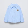 CAMISA RAYAS PARCHE OSO