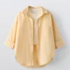 CAMISA RAYAS Y TOP RIB