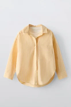 CAMISA RAYAS Y TOP RIB