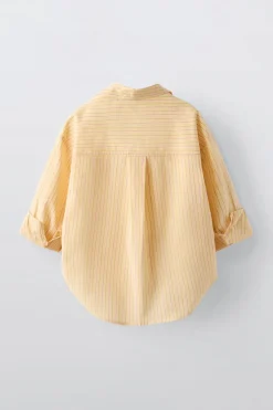 CAMISA RAYAS Y TOP RIB