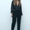 CAMISA SATINADA PLUMAS
