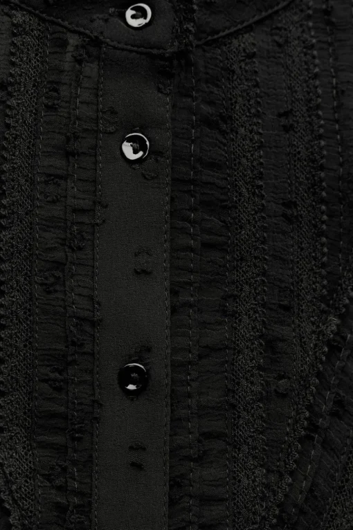 CAMISA SEMITRANSPARENTE PLUMETI