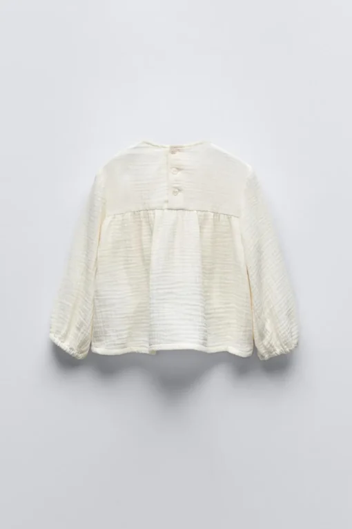 CAMISA TEXTURA FLORES