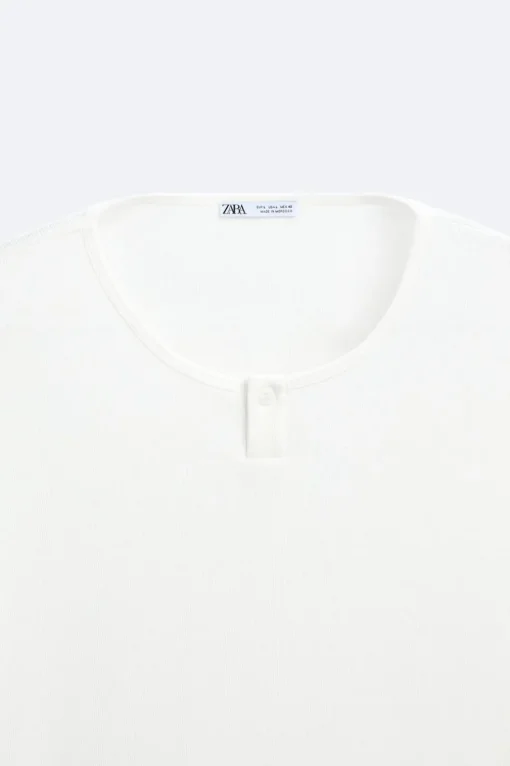 CAMISETA CUELLO BOTÓN