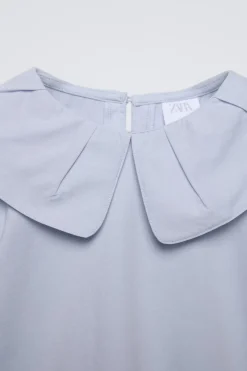 CAMISETA CUELLO PINZAS