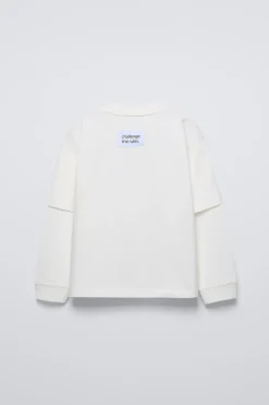 CAMISETA DOBLE MANGA TEXTO