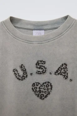 CAMISETA PARCHE ANIMAL PRINT