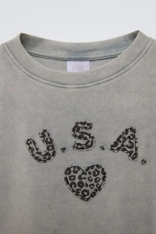 CAMISETA PARCHE ANIMAL PRINT