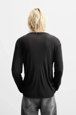 CAMISETA SEMITRANSPARENTE