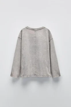 CAMISETA TEXTO FLOCK