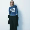 CAMISETA VARSITY EFECTO LAVADO