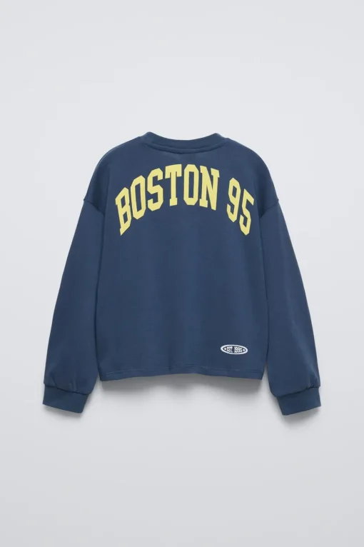 CAMISETA VARSITY TEXTO
