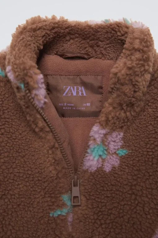 CAZADORA BORREGUILLO ESTAMPADO FLORES