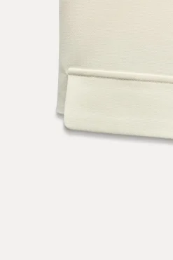 CHALECO CORTO TAPETAS
