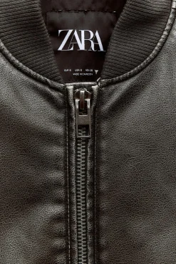 CHAQUETA BOMBER OVERSIZE EFECTO PIEL DESGASTADA