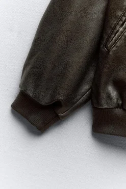 CHAQUETA BOMBER OVERSIZE EFECTO PIEL DESGASTADA